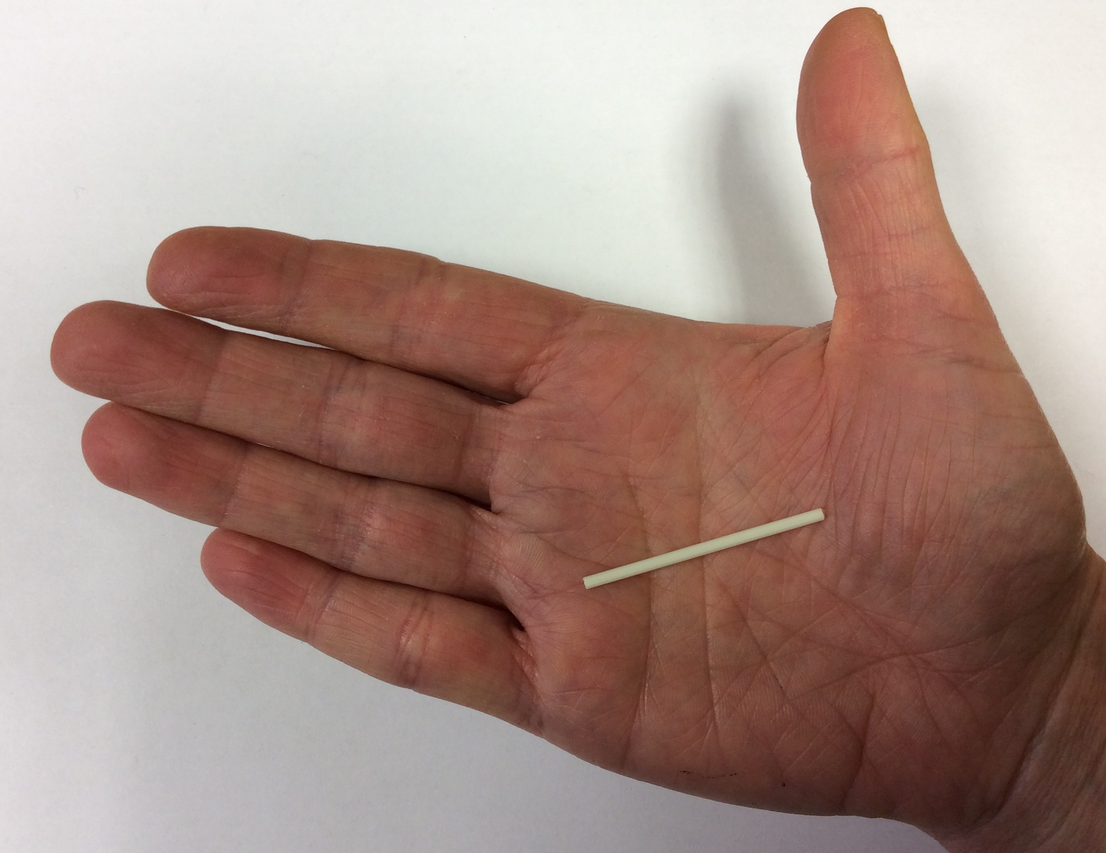 photo showing size of  contraceptive implant